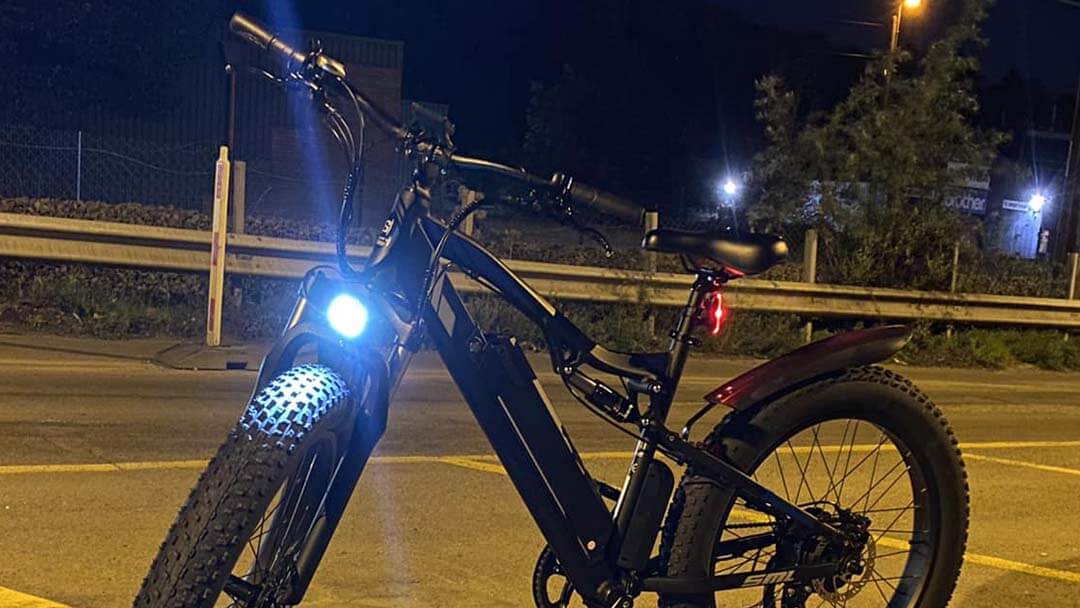 riding an electric bike at night